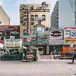 Why do competitors open their stores next to each other